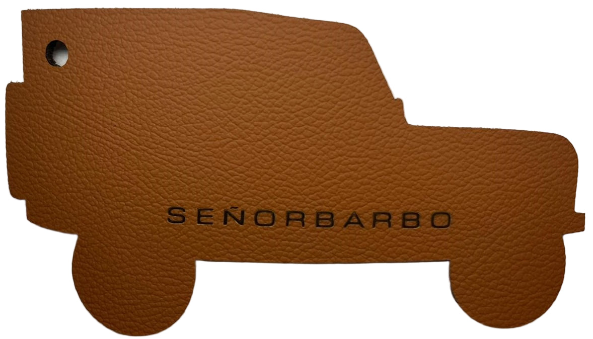 Brown leather keychain with &#39;SenorBarbo&#39; branding on a white background