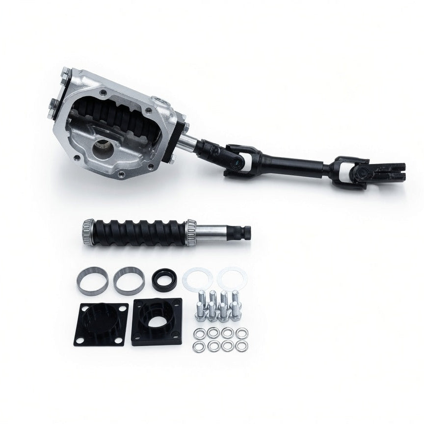 A mechanical hardware kit on a white background, featuring a silver metal housing, a black and silver shaft with a splined end, a black ribbed sleeve, and various mounting gaskets, washers, and screws.