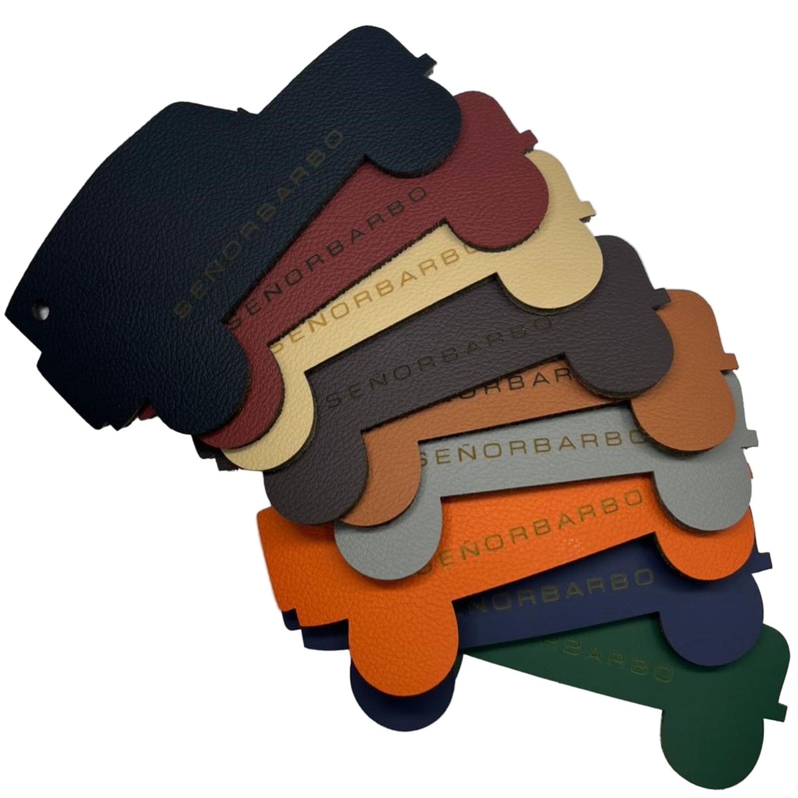 Stack of leather samples with 'SENORBARBO' branding on a white background